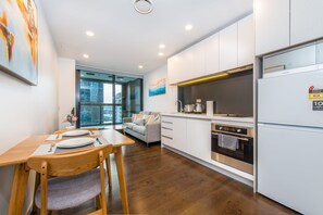 City Apartment, 1 Bedroom, Non Smoking | Private kitchen | Full-size fridge, microwave, oven, dishwasher