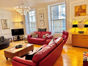 TV, DVD player, books, video library