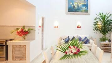 40-inch flat-screen TV with satellite channels, TV, books