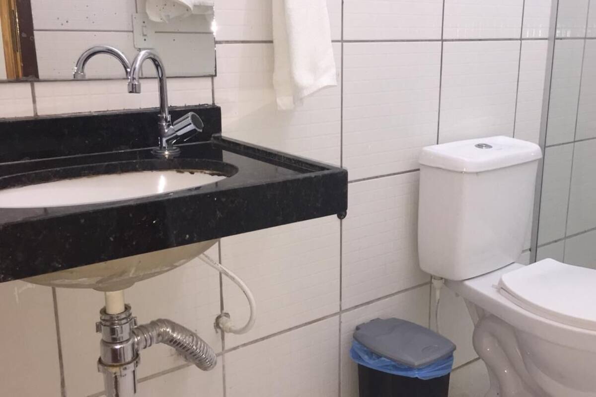 Shower, towels, soap, toilet paper