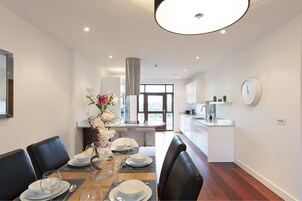 Apartment, 3 Bedrooms | Living area | Flat-screen TV