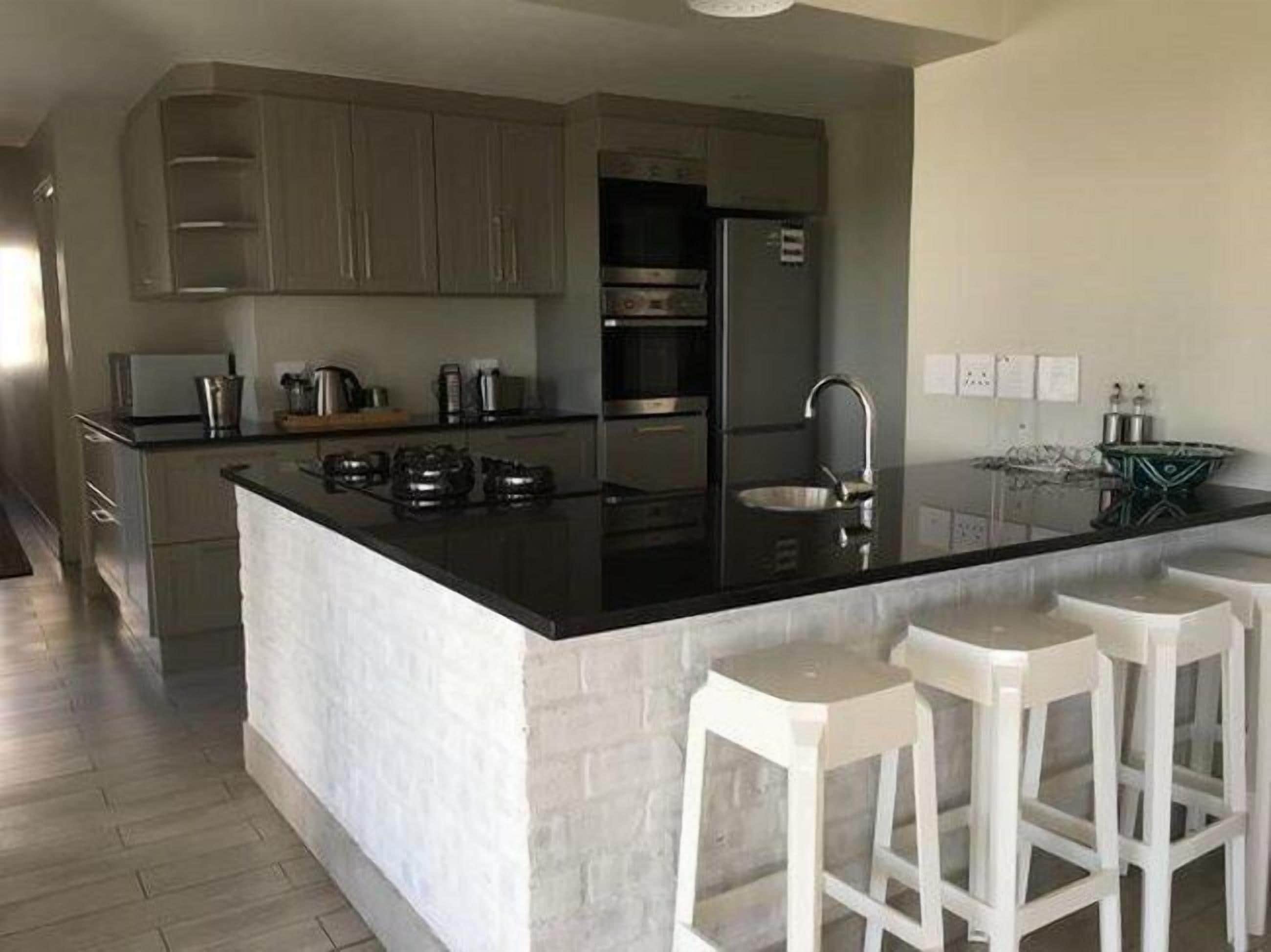 Family House, 4 Bedrooms | Private kitchen | Full-sized fridge, oven, cookware/dishes/utensils