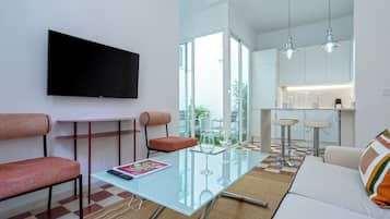 Apartment (2 Bedrooms) | Living area | 32-inch TV with cable channels