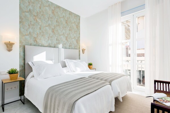 3 عدّة غرف نوم ومكواة/لوح كي وواي فاي مجانًا وملاءات أسرّة