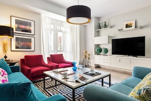 Apartment (4 Bedrooms) | Living area | 32-inch TV with cable channels