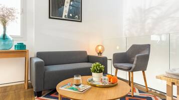 Apartment (2 Bedrooms) | Living area | 32-inch TV with cable channels