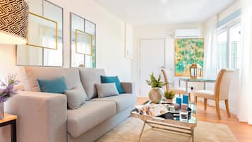 Apartment (2 Bedrooms) | Living area | 32-inch TV with cable channels