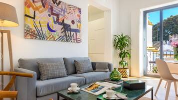 Apartment (2 Bedrooms) | Living room | 32-inch TV with cable channels