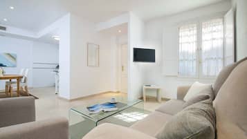 Apartment (1 Bedroom) | Living room | 32-inch TV with cable channels