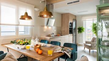 Apartment, 3 Bedrooms | Private kitchen | Full-size fridge, microwave, oven, stovetop