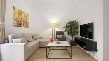 En 32-tommers TV med kabel-kanaler