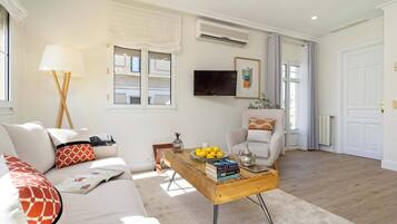 Apartment (1 Bedroom) | Living room | 32-inch TV with cable channels