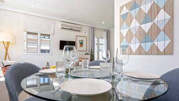 Apartment (1 Bedroom) | Living area | 32-inch TV with cable channels