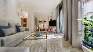 Apartment (2 Bedrooms) | Wohnbereich | 32-Zoll-Fernseher mit Kabelempfang