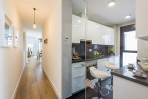 Apartment, 2 Bedrooms | Private kitchen | Full-sized fridge, microwave, oven, dishwasher