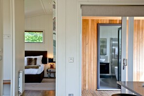 1 bedroom, desk, iron/ironing board, travel crib