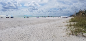 On the beach, sun loungers, beach towels