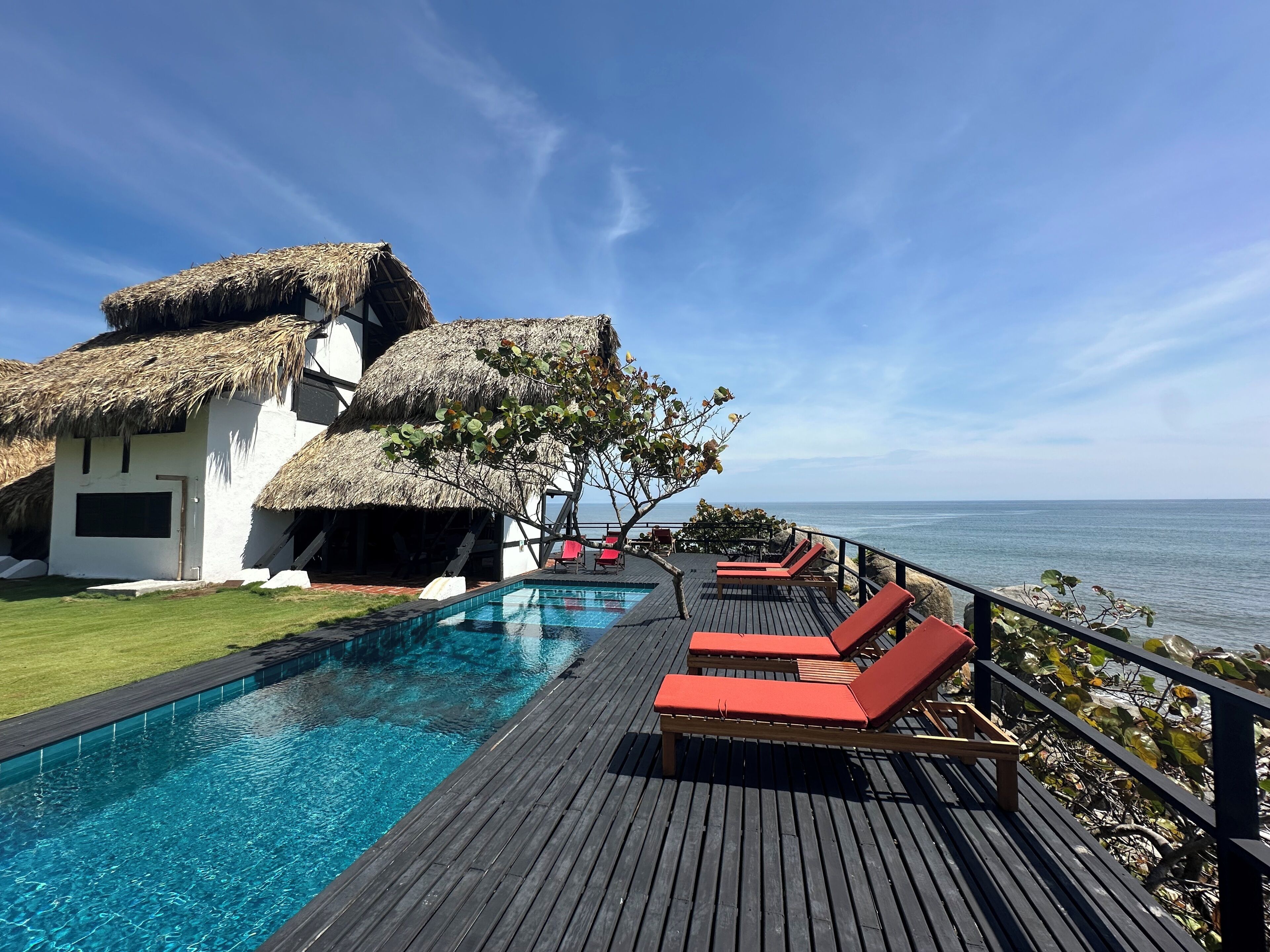 Outdoor pool, pool umbrellas, sun loungers