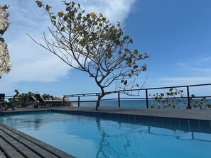 Outdoor pool, pool umbrellas, pool loungers