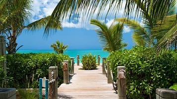 On the beach, sun-loungers, beach towels