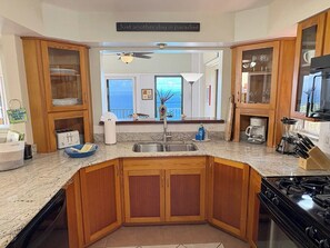 Coffee/tea maker, fridge, microwave, oven