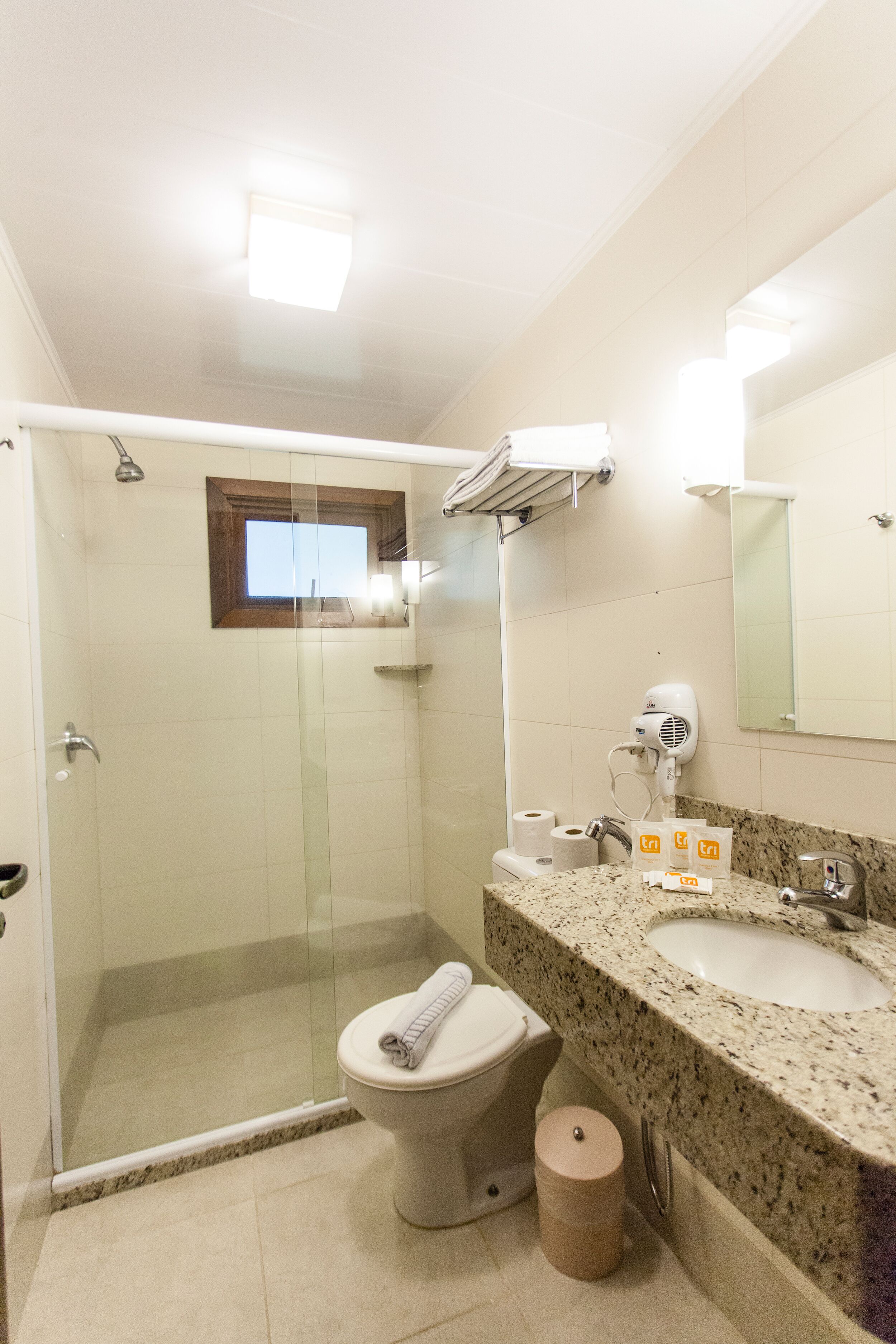 deluxe double room | bathroom | shower, rainfall showerhead, hair dryer, towels