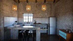 Cottage (Olienhout) | Private kitchen | Coffee/tea maker, full-size fridge, microwave, electric kettle - Wolvekraal Guest Farm (Prince Albert)