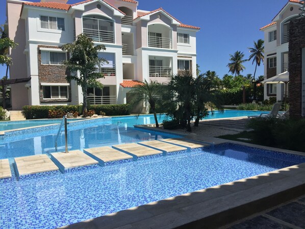 Outdoor pool, pool umbrellas, pool loungers