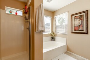 Combined shower/bathtub, hair dryer, towels, soap