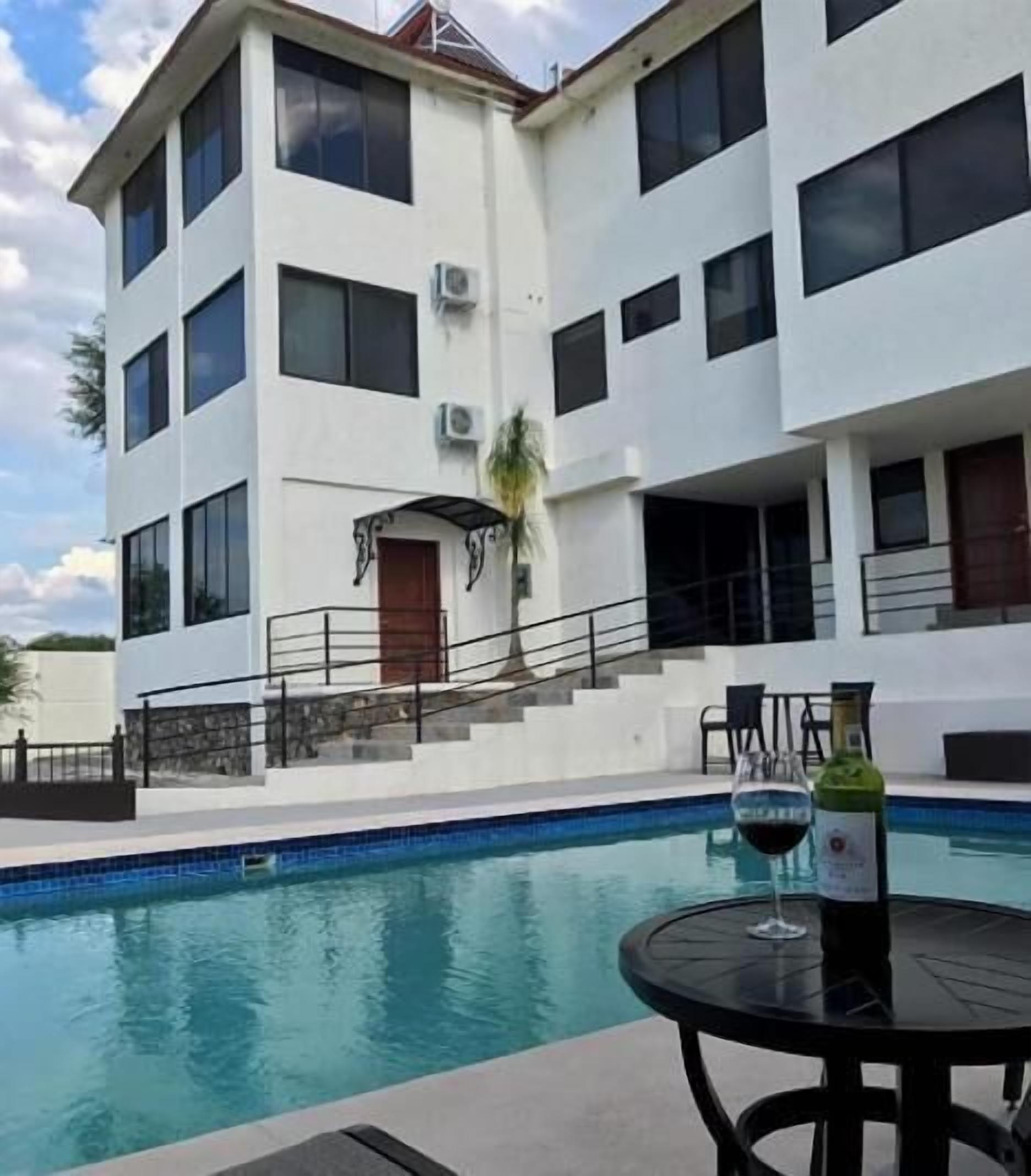 outdoor pool, open 8:30 am to 10:00 pm, pool umbrellas