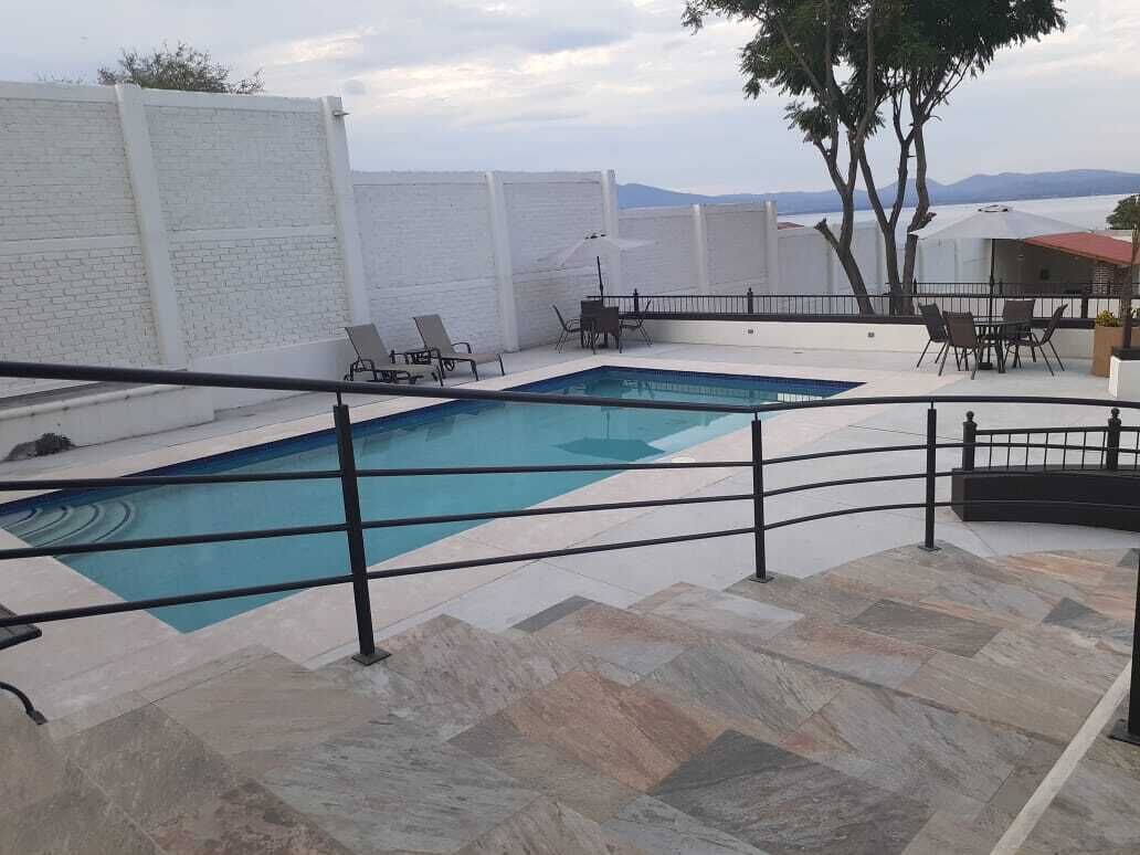 outdoor pool, open 8:30 am to 10:00 pm, pool umbrellas