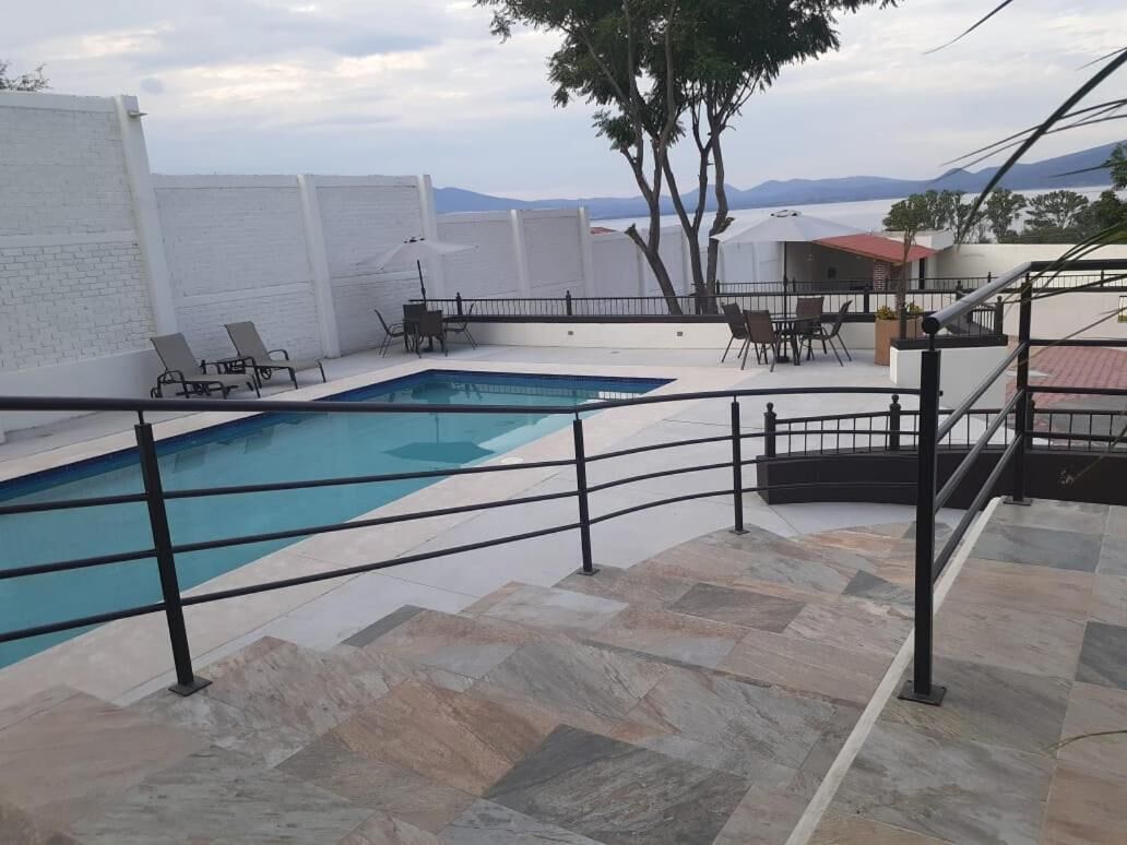 outdoor pool, open 8:30 am to 10:00 pm, pool umbrellas