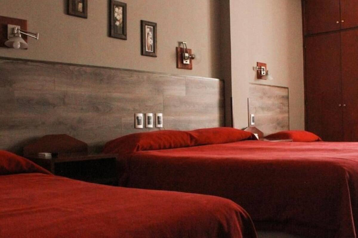 Standard Quadruple Room | Cofres nos quartos, Wi-Fi de cortesia, roupa de cama