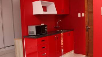 Habitación ejecutiva | Cocina privada | Frigorífico y microondas