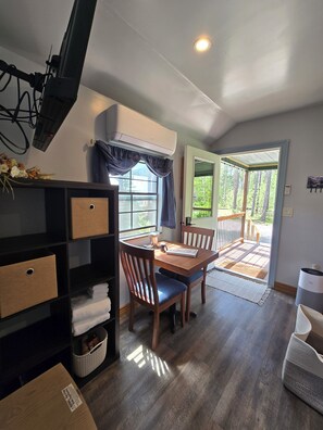 Dining - Eagle's Nest: a cozy cabin beneath the pines at Glacier Lodge Cabins (Coram)