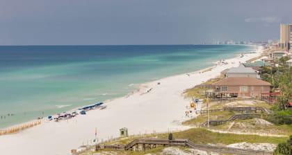 Gulf Views ~ Private Balcony ~ Seasonally Heated Pool ~ Fitness Center