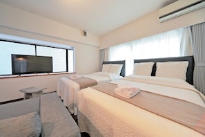 Apartment, 1 Bedroom | 1 bedroom, desk, laptop workspace, blackout curtains