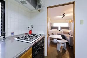 Apartamento, 1 quarto | Cozinha privada | Geladeira, micro-ondas, cooktop, chaleira elétrica
