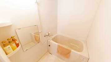 Apartment, 1 Bedroom | Bathroom | Separate tub and shower, free toiletries, hair dryer, slippers
