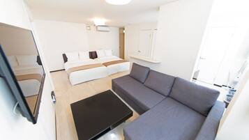 Apartment, 1 Bedroom | Living area | 43-inch flat-screen TV with digital channels, TV