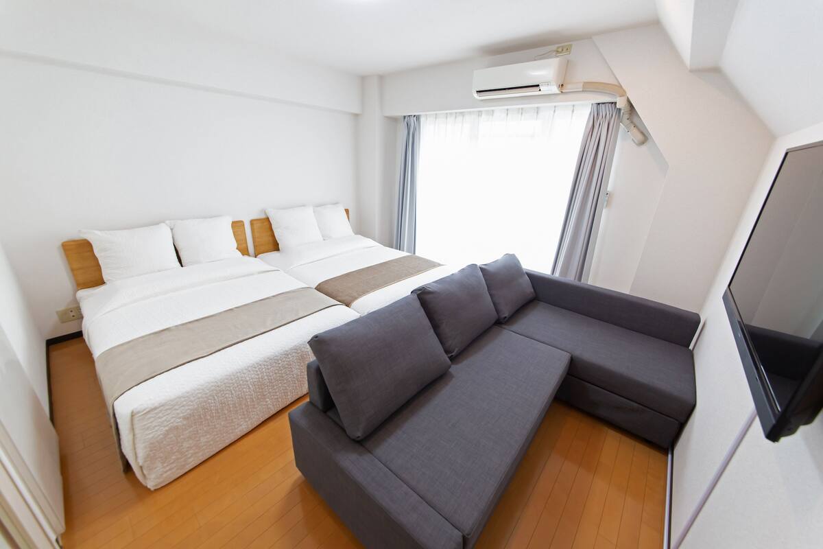 Apartment, 2 Bedrooms | Laptop workspace, blackout curtains, free WiFi, bed sheets