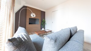 Departamento, 2 habitaciones | Área de sala de estar