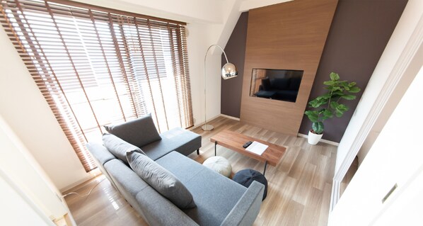 Departamento, 2 habitaciones | Sala de estar | Televisión 