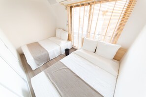 Departamento, 2 habitaciones | 2 habitaciones, escritorio y espacio para trabajar con laptop 