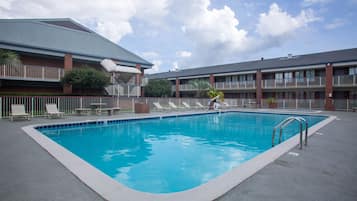 Seasonal outdoor pool, open 9:00 AM to 9:00 PM, sun loungers