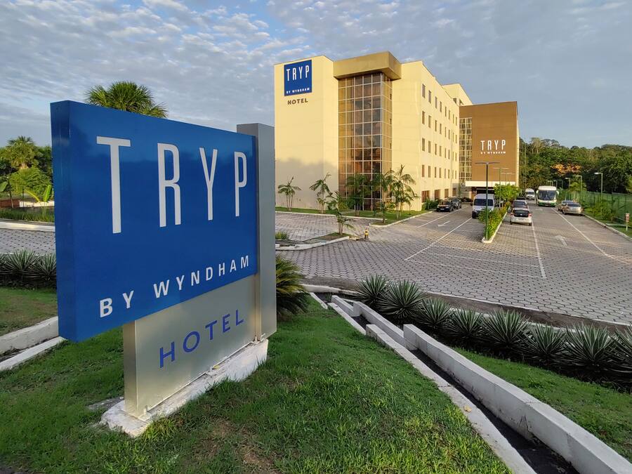 A TRYP by Wyndham hotel sign with a modern building in the background.