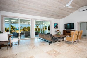 House, Multiple Beds | Living room | 32-inch flat-screen TV with digital channels, TV - Seven Palms by Eleuthera Vacation Rentals (Governor's Harbour)