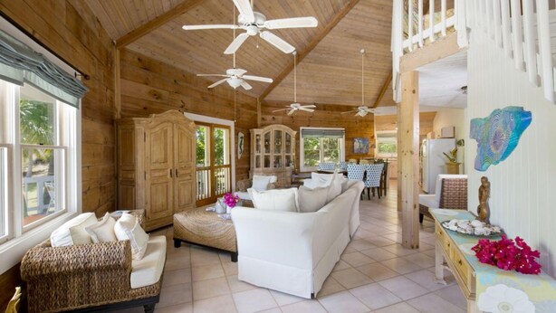 House, 5 Bedrooms | Living room | 32-inch flat-screen TV with digital channels, TV - Shangri-la & Orchid Cottage by Eleuthera Vacation Rentals (Governor's Harbour)