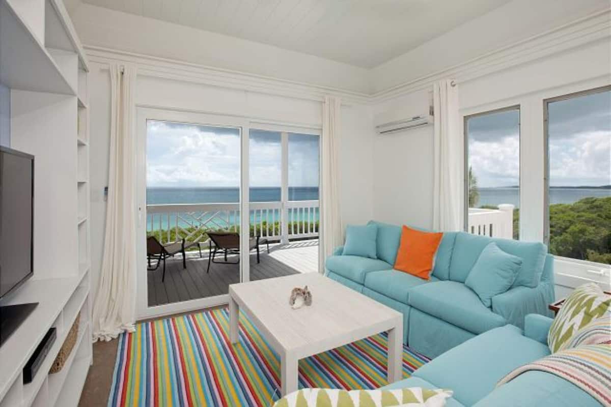 Condo, 2 Bedrooms | Living room | 32-inch flat-screen TV with satellite channels, TV, DVD player