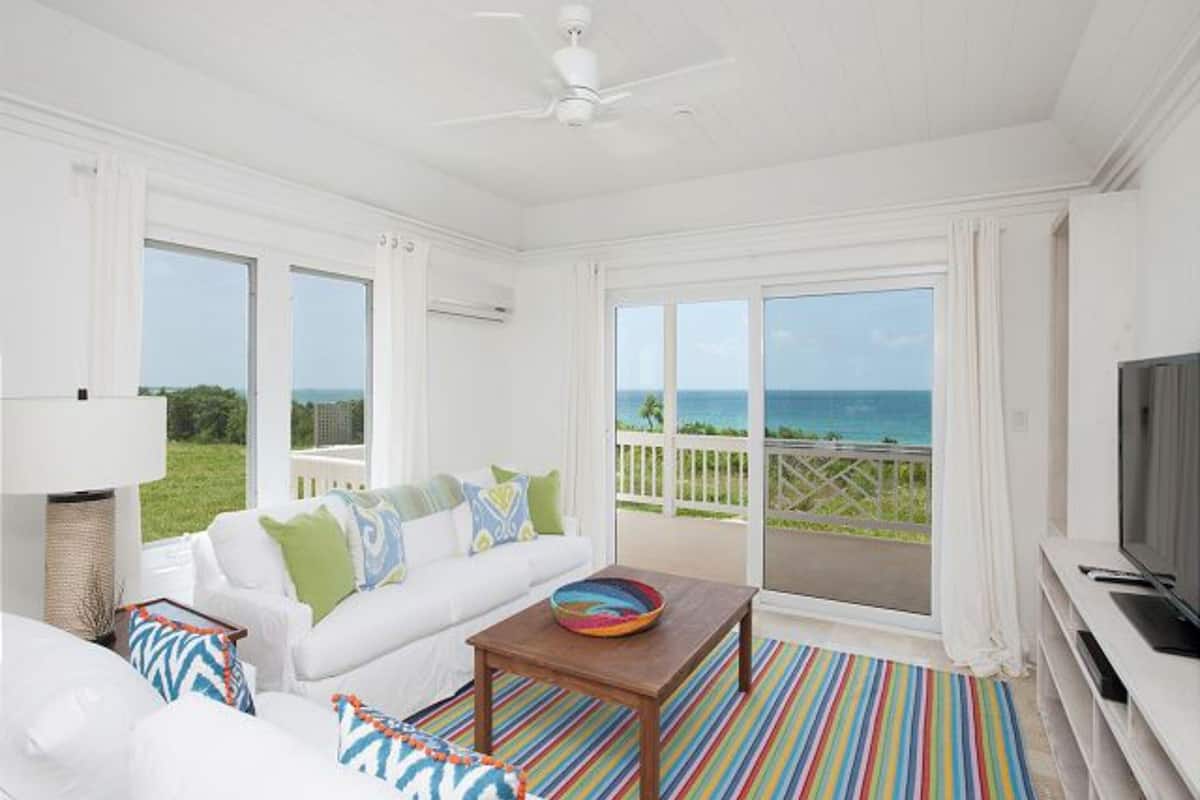 Condo, 2 Bedrooms | Living room | 32-inch flat-screen TV with satellite channels, TV, DVD player